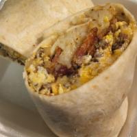 Porkrito · Shredded cheese, hash brown, two eggs, 2 bacon and sausage, wrapped in a tortilla and served...