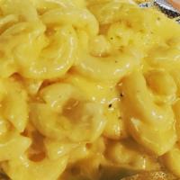 Mac & Cheese · Elbow noodle tossed in our homemade cheese sauce.