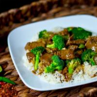 Broccoli Beef · Steamed jasmine rice with brown sauce.