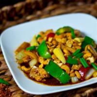 Cashew Chicken · Stir fried chicken with cashew nuts, baby corn, green onion and red bell pepper.