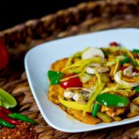 Ginger Delight · Stir fried chicken with fresh ginger, mushroom, green and red bell pepper and onion.