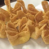 Crabmeat Rangoons · 8 pieces. Comes with sweet and sour sauce.