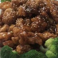 Sesame Chicken · Served in a sweet sauce with sesame seeds.