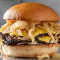 Okie · Two all-beef patties, American cheese, haystack onions, with onions grilled into both pattie...