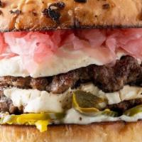 Everything · Two all-beef patties, cream cheese, candied jalapeno, pickled onion, and mayo served on an 