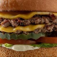 Vegan Impossible Burger · Vegan American cheese, lettuce, tomato, pickle, and vegan mayo on a gluten-free vegan bun.
