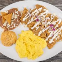 Chilaquiles · Transport yourself to the south of the border with this authentic Mexican dish. Tortilla chi...