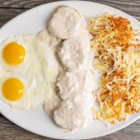 Biscuits & Gravy · Two open biscuits topped with our country gravy and diced pork sausage. Served with two extr...