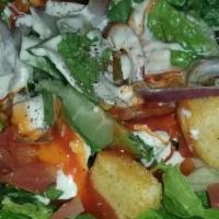 House Salad  · Mixed greens, tomatoes, cucumbers, onions, topped with croutons. Choice of dressing