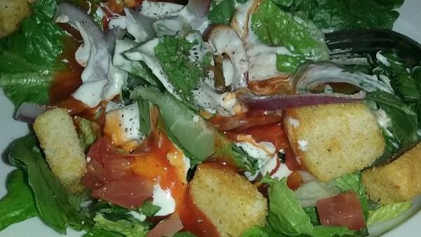 House Salad  · Mixed greens, tomatoes, cucumbers, onions, topped with croutons. Choice of dressing
