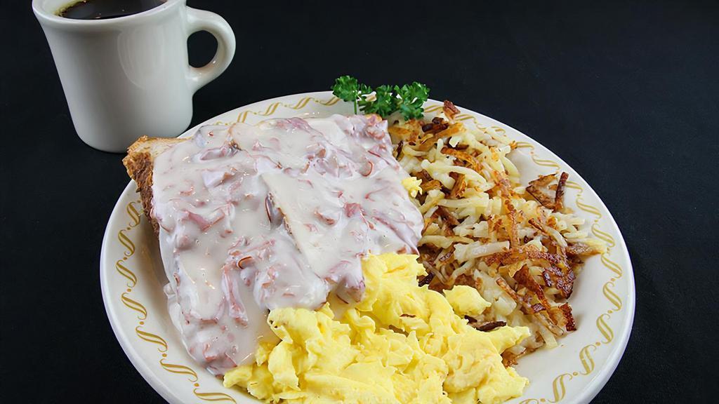 Creamed Chipped Beef · Two biscuits, two eggs, country fries, all on one plate covered with our famous chipped beef.

Consuming raw or under-cooked meats, poultry, seafood or eggs may pose an increased risk of food-borne illness.