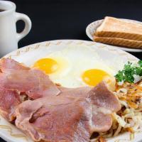 Country Ham · A little bit different tasty country ham served with two eggs, country fries and choice of b...