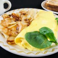 Spinach Omelette · A country size omelette filled with fresh spinach leaves, diced tomatoes, onions, bacon bits...