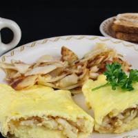 The Country Omelette · A country size omelette filled with grilled onions and hash browns. A long time favorite!