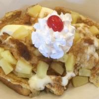 Pineapple Upside Down · Our French toast covered with cheesecake filling, cinnamon, brown sugar, pineapple, whipped ...