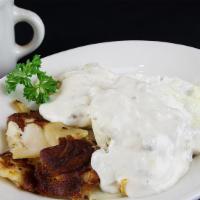 Half Yard · One egg, one biscuit, country fries covered with sausage gravy.

Consuming raw or under-cook...