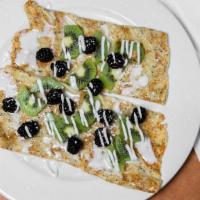 Lemon Poppy Seed Crepes · Kiwis, Blackberries, and vanilla bean glaze