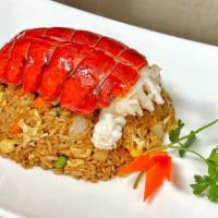 Lobster Fried Rice · Lobster Fried Rice includes one whole lobster tail, corn, onion, green bean, carrot, and egg...