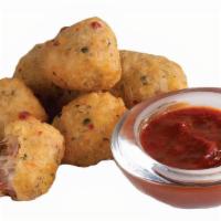 Pepperoni Pizza Bites 6 Pc · Breaded pizza bites stuffed with pepperoni and cheese, served with marinara dipping sauce. 6...