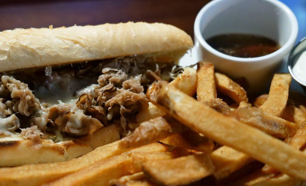 Prime Rib French Dip · Thinly sliced prime rib on a ciabatta, horseradish sauce and au jus for dipping.
