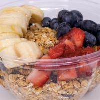 Overnight Oats · Oats, Almond Milk, Cinnamon Topped with: Strawberries, Blueberries, Bananas, Granola, & Agave