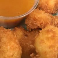 Coconut Shrimp Basket · Six jumbo shrimp deep fried in our coconut batter and served with a side of apricot sauce.
