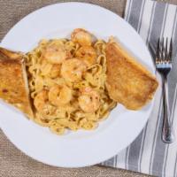 Shrimp Diablo (Salad) · Gulf shrimp sauteed in a Cajun cream sauce served over fettuccine. (no potato or vegetable).