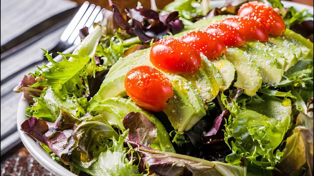 Avocado Salad · Avocado with mixed green, grape tomato, olive oil and sesame ginger dressing.