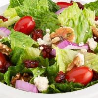 Small - Cranberry Walnut Salad · Romaine lettuce, dried cranberries, walnuts, tomatoes red onions, bleu cheese & raspberry vi...