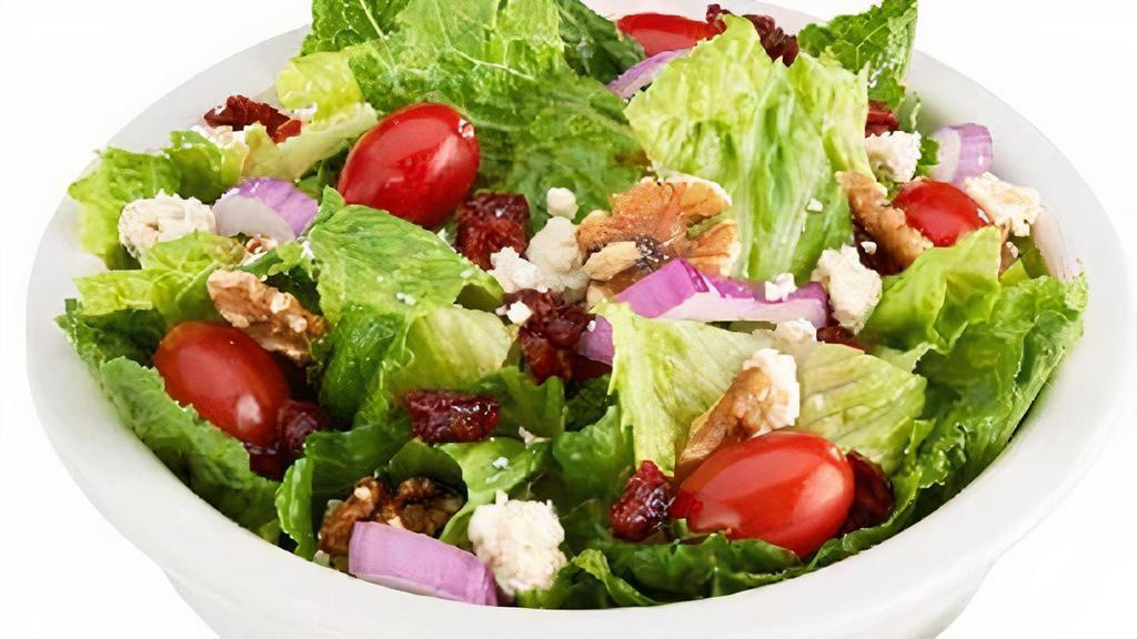 Large - Cranberry Walnut Salad · Romaine lettuce, dried cranberries, walnuts, tomatoes red onions, bleu cheese & raspberry vinaigrette, dressing.
