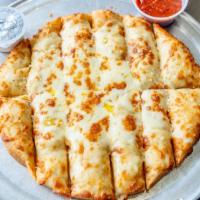 Gluten Free Garlic Cheese Bread · Gluten free crust spread with garlic butter and topped with three cheese blend and sprinkled...