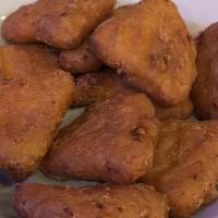 Mac N Cheese Bites · Straight out of the trailer park and on to your plate. Fried and battered macaroni and chees...