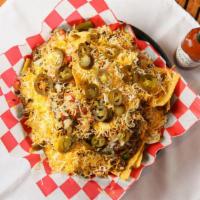 Nacho Platter · CRISPY HOMEMADE CORN TORTILLA CHIPS TOPPED WITH GROUNF BEED OR DICED CHICKED, CHEEDAR CHEESE...
