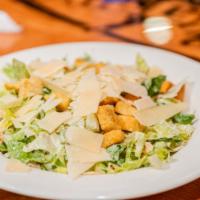 Qb Caesar Salad · ICEBERG AND ROMAINE LETTUCE TOSSED IN CREAMY CAESAR DRESSING TOPPED WITH GRILLED CHICKEN BRE...