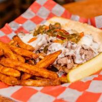 Italian Beef Sandwich · SHAVED SEASONED BEEF MARINATING IN SPICES AND SEASONING SERVED ON A HOGIE BUN TOPPED WITH MO...