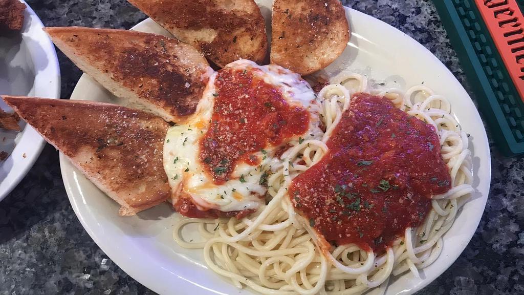 Chicken Parmesan · TENDER BREADED CHICKEN BREAST SERVED ON SPAGHETTI NOODLES WITH OUR HOMEMADE SAUCE