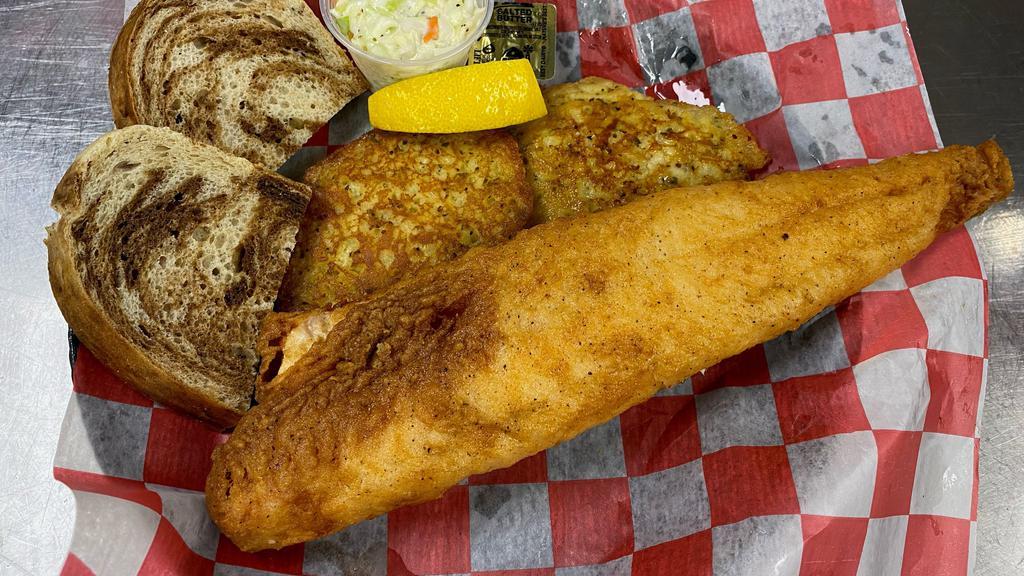 Walleye · SERVED WITH COLESLAW, RYE BREAD,,TARTER SAUCE AND A LEMON WEDGE