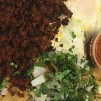 Chilaquiles · w/ no eggs comes w/corn tortillas chips dipped in homemade green or red or ala diabla salsa,...