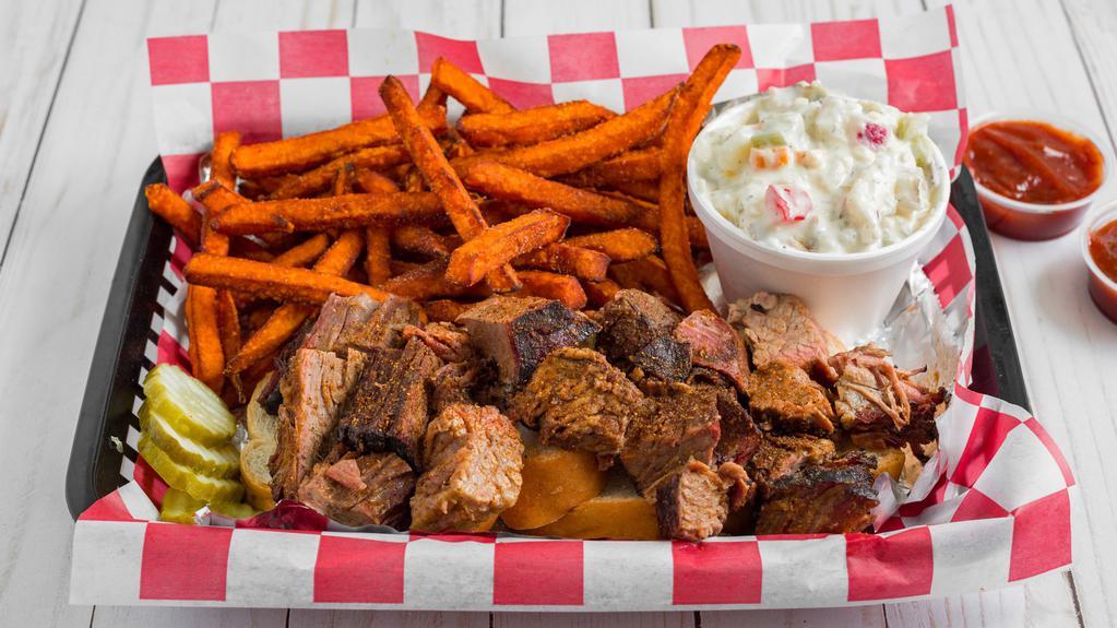 Burnt Ends · Hearty plate of our delicious smoked burnt ends with your choice of two sides