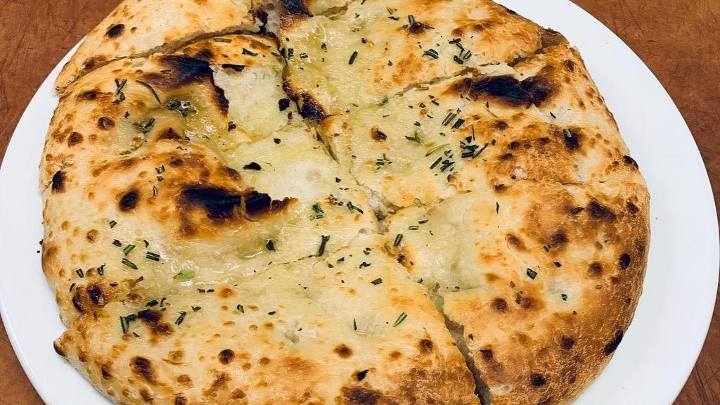 Focaccia · Bigalora dough, garlic oil, rosemary, sea salt.  This item is vegan and can be made gluten free  upon request