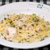 Chicken Piccata · Sautéed slices of chicken in a lemon- butter sauce accented with capers and tossed in lingui...