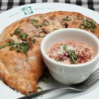 Greek Garden · A delicious blend of spinach, red onion, black olives, tomato and feta cheese.