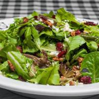 Spring Mix · Served with pecans, candied cranberries, crumbled blue cheese and Dijon vinaigrette.