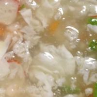 Seafood Soup · Shrimp, scallops and crab meat simmered with diced vegetables in rich broth.