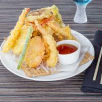 Shrimp And Veggie Tempura - Otg · 4 pieces. battered shrimp and assorted vegetable tempura served with light soy sauce ($2 eac...