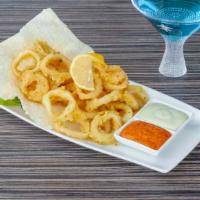 Calamari Tempura - Otg · Calamari fried in a light Sapporo Beer batter, served with a side of creamy wasabi and spicy...