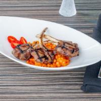 Rack Of Lamb - Otg · Grilled lamb marinated in lemon grass, served with sun dried tomato couscous drizzled with a...