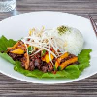 Bul Go Gi - Otg · Sliced beef marinated in a ginger soy atop sautéed vegetables, garnished with bean sprouts a...