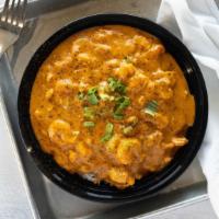 Cream Sauce Seafood Etouffee · fish, shrimp and crawfish served with rice.