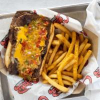Ribeye Philly Cheese-Steak · Three cheese blend over a ribeye steak with red and green bell peppers, yellow onions and ou...